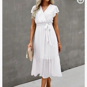 White dress perfect for bach party, engagement party, or rehearsal dinner